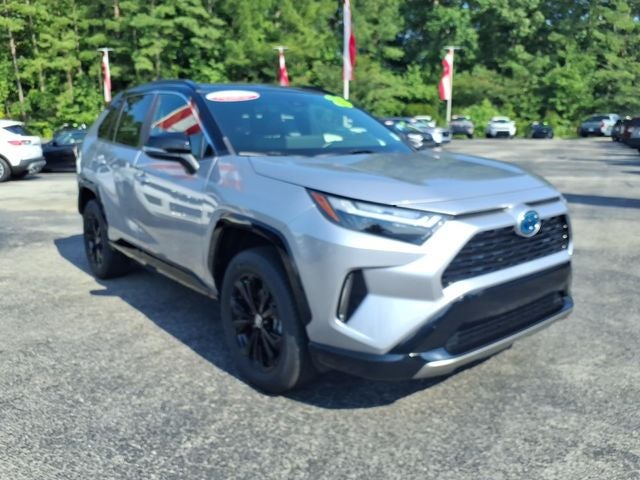 2023 Toyota RAV4 Hybrid XSE in Midnight Black Metallic — front three-quarter view